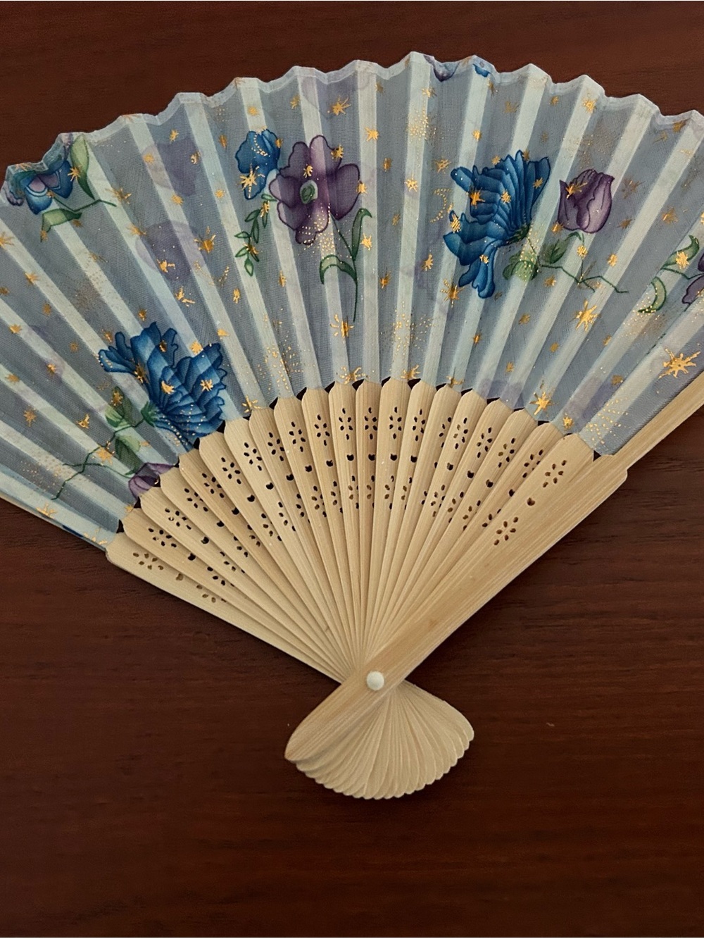 Handheld Folding Fan with Blue Floral Design on a silk like fabric w/ Bamboo